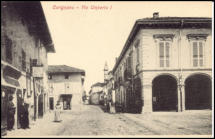 Vista dall'attuale piazza Liberazione; forse l'albergo Parma non esisteva ancora in quanto manca l'insegna, inoltre pur essendoci la ciminiera non si scorgono le caratteristiche mura del lanificio Bona.